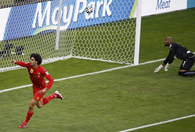 Marouane Fellaini celebrates after scoring the equaliser against Algeria, 17 June Marouane Fellaini Belgium Algeria