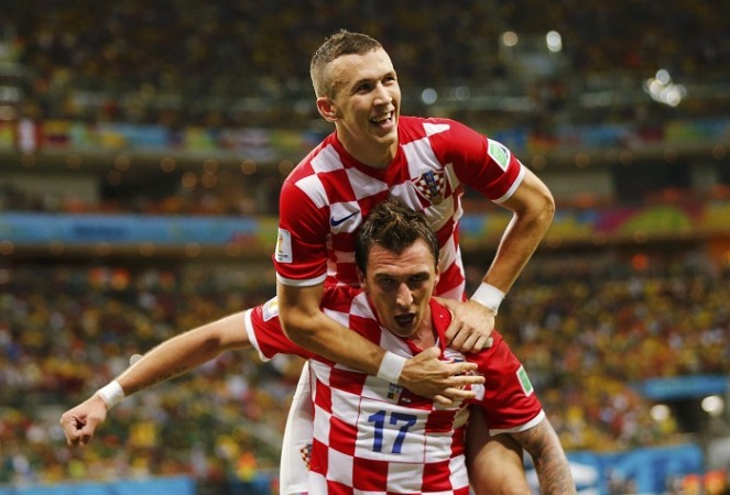 Croatia's Mario Mandzukic celebrates after scoring a goal with teammate Ivan Perisi. Mario Mandzukic