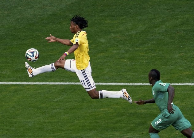 Colombia winger Juan Cuadrado controls the ball against Ivory Coast in their FIFA World Cup 2014 Group C match, 19 June Juan Cuadrado Colombia Ivory Coast