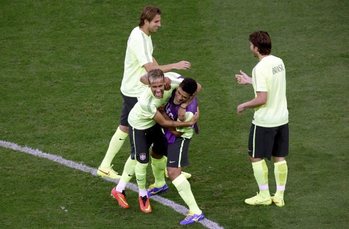Brazil players share a laugh during a training session, 22 June Brazil Neymar Hulk