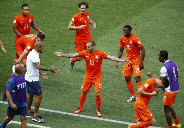 Netherlands playmaker Wesley Sneijder celebrates with his teammates after scoring the crucial equaliser against Mexico Wesley Sneijder Netherlands