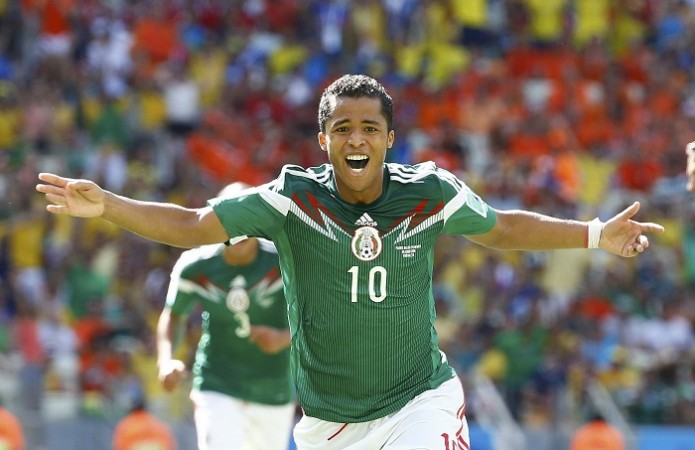 Mexico forward Giovani Dos Santos celebrates the opening goal of the game against Holland Giovani Dos Santos Mexico