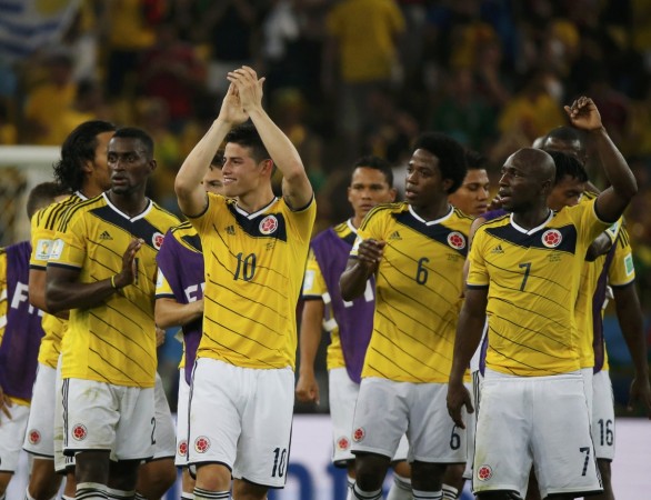 Colombia's James Rodriguez and teammates celebrate at the end of the 2014 World Cup round of 16 game between Colombia and Uruguay at the Maracana stadium Colombia