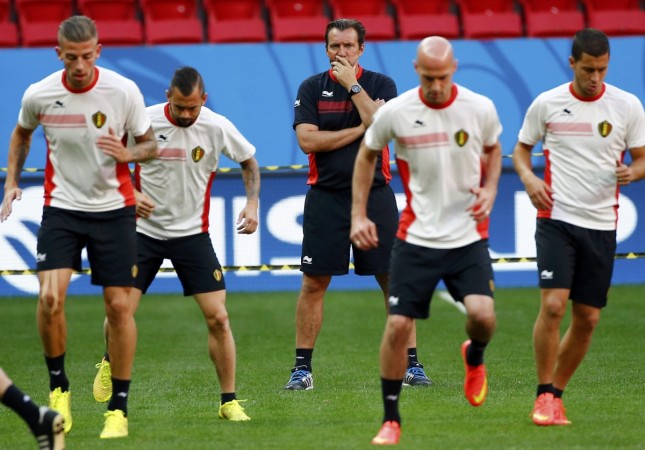 Belgium's coach Marc Wilmots watches his players during a team training session at the national stadium in Brasilia Belgium