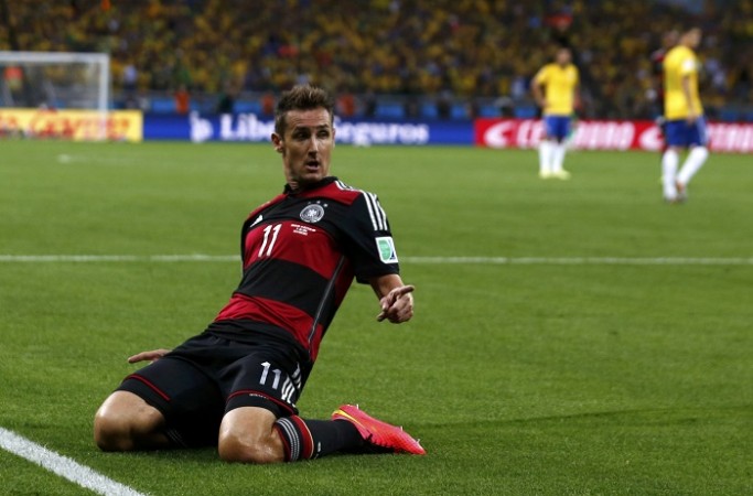 Germany striker celebrates his record-breaking goal in the unbelievable semifinal against Brazil Miroslav Klose Germany