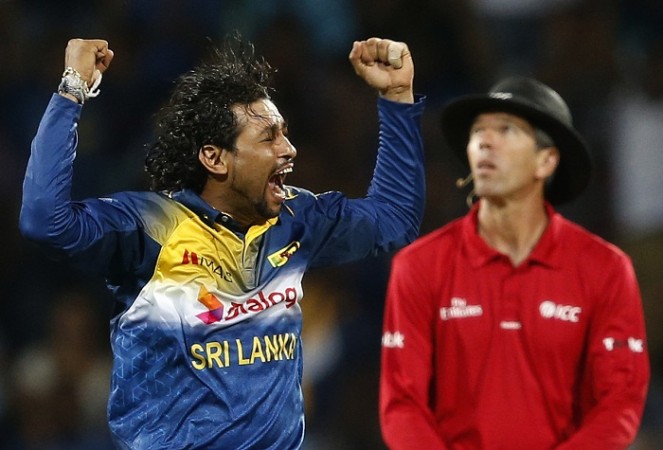 Sri Lanka's Tillakaratne Dilshan celebrates after taking the wicket of South Africa's David Miller. Tillakaratne Dilshan
