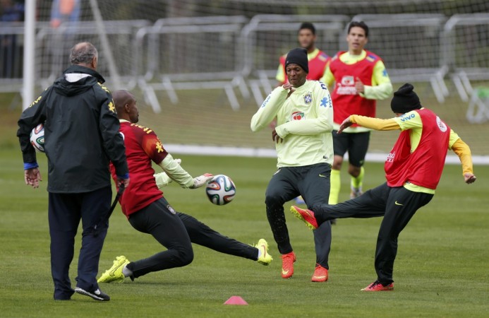 Brazil's coach Scolari, goalkeeper Jefferson, Jo and Bernard attend a training session in Teresopolis Brazil