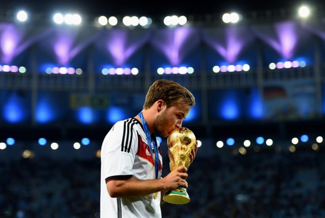 Mario Götze kisses the trophy World Cup Finals