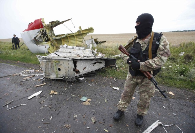 A team of international observers set to investigate the alleged downing of the Malaysian Airlines Flight MH17 have been blocked by 'drunk' rebels.