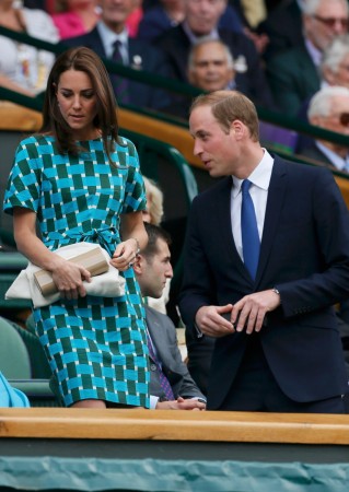 Britain's Prince William and his wife Catherine, Duchess of Cambridge applaud during the men's singles final tennis match between Novak Djokovic of Serbia and Roger Federer of Switzerland at the Wimbledon Tennis Championships, in London Kate Middleton