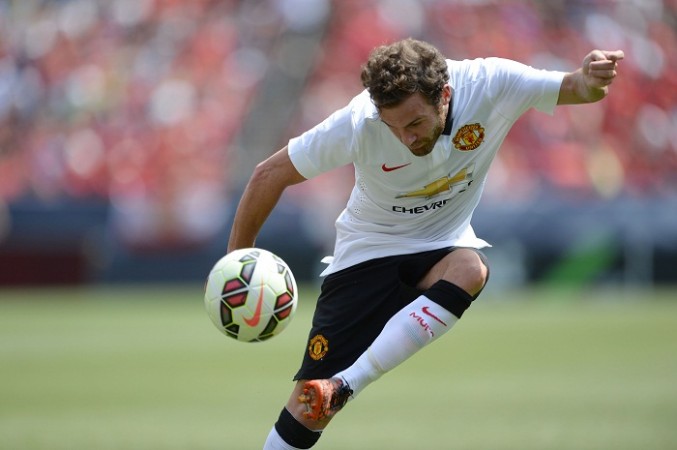 Manchester United playmaker Juan Mata controls the ball during their preseason friendly against Roma Juan Mata Manchester United