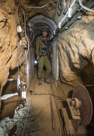 Hamas has released an extraordinary footage which purports to show a dramatic tunnel infiltration of its military wing into the Israeli border. Hamas has released an extraordinary footage which purports to show a dramatic tunnel infiltration of its military wing into the Israeli border.