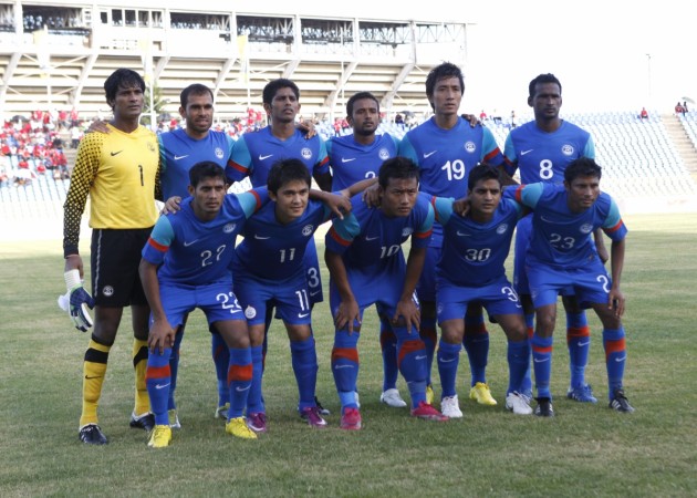 The Indian team pose for a photo before the start of a friendly match. Indian Soccer Team