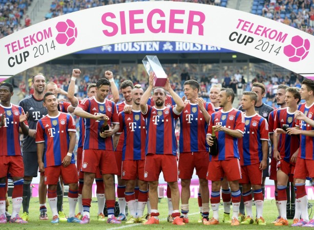 Bayern's Ribery holds up the trophy after the club's German Telekom Cup win against VfL Wolfsburg. Bayern Munich