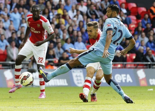 Arsenal midfielder Aaron Ramsey scores against Manchester City in the Communuty Shield Aaron Ramsey Yaya Sanogo Arsenal Gael Clichy Manchester City