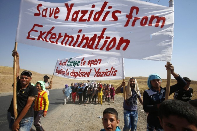 Members of the minority Yazidi sect in Iraq are demanding protection from the ISIS militants-Reuters