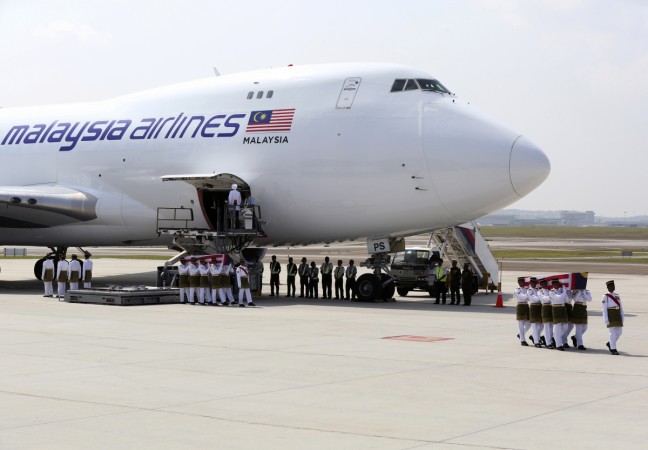 People across Malaysia held a minute's silence and wore black on Friday after bodies of MH17 victims finally arrived. People across Malaysia held a minute's silence and wore black on Friday after bodies of MH17 victims finally arrived.