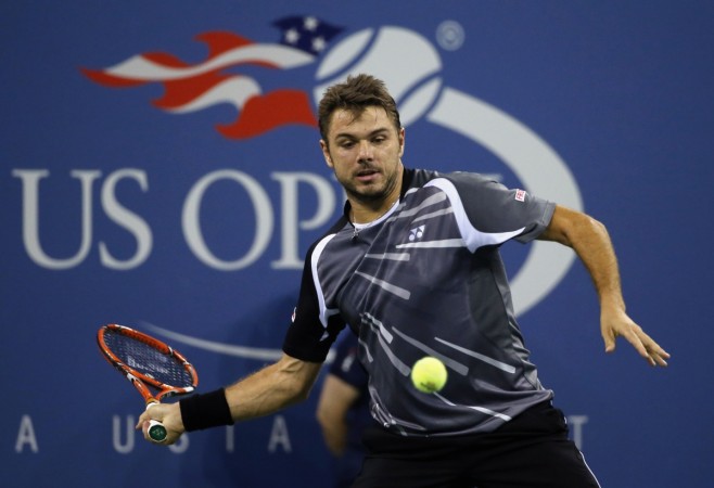 Stanislas Wawrinka returns to Thomaz Bellucci during their men's singles match at the US Open. Stanislas Wawrinka