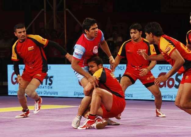 The Bengaluru Bulls (red and yellow) will look to stop U Mumba in the Pro Kabaddi League semifinal Bengaluru Bulls Jaipur Pink Panthers