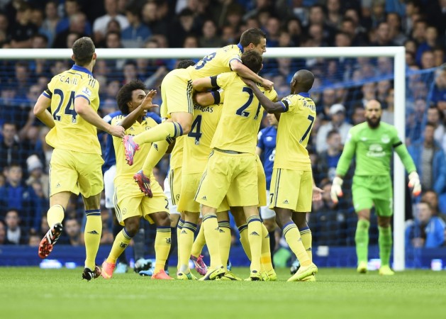 Chelsea players celebrate Diego Costa's opening goal against Everton during their Premier League match at Goodison Park in Liverpool Chelsea