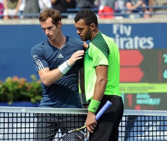 Jo-Wilfried Tsonga shakes hands with Andy Murray after their match at the Rogers Cup tennis tournament. Andy Murray and Jo-Wilfried Tsonga