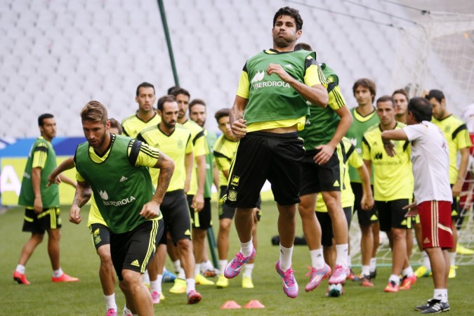 Spain's Sergio Ramos (front L) and Diego Costa (C) attend a training session at Stade de France stadium in Saint-Denis, near Paris Spain