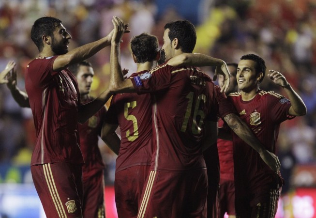 Spain's Sergio Busquets (2nd R) celebrates with teammates after scoring against Macedonia during their Euro 2016 qualifying soccer match at the Ciudad de Valencia stadium in Valencia Spain