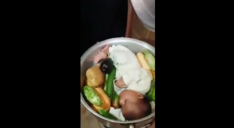A video where a Saudi man puts newborn baby into a cooking pot for meal has sparked outrage. A video where a Saudi man puts newborn baby into a cooking pot for meal has sparked outrage.