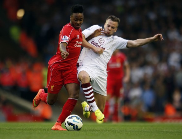 Liverpool's Raheem Sterling (L) challenges Aston Villa's Tom Cleverley during the match at Anfield Liverpool 0-1 Aston Villa