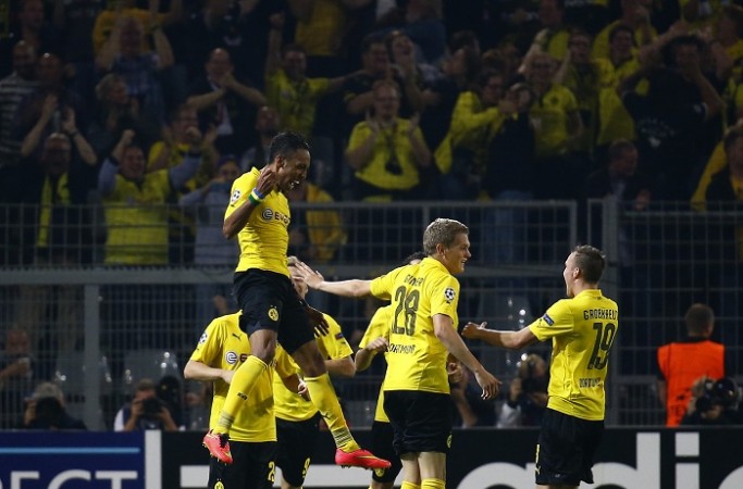 Pierre-Emerick Aubameyang celebrates with his Borussia Dortmund teammates after scoring against Arsenal in their Champions League Group D game Aubameyang Borussia Dortmund