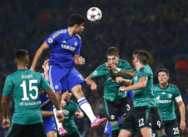 Chelsea's Diego Costa (C) heads the ball during their Champions League soccer match against Schalke 04 at Stamford Bridge Chelsea vs Schalke