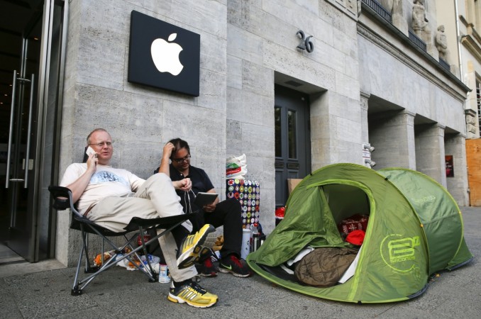 Helge Bruhn (L) and Phil, who didn't give his last name, camp ahead of the September 19 release of the iPhone 6 and iPhone 6 Plus, in front of an Apple Store at Kuerfuerstendamm boulevard in Berlin September 16, 2014. Both men have camped since September 13 outside the store to be the first customers to buy the iPhone 6 when it's available. REUTERS/Fabrizio Bensch Apple iPhone 6 India Release Date Pushed to November