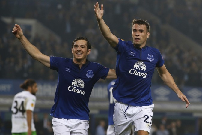 Everton's Seamus Coleman (R) celebrates after scoring the second goal with teammate Leighton Baines during their Europa League match against VfL Wolfsburg at Goodison Park Everton vs Wolfsburg