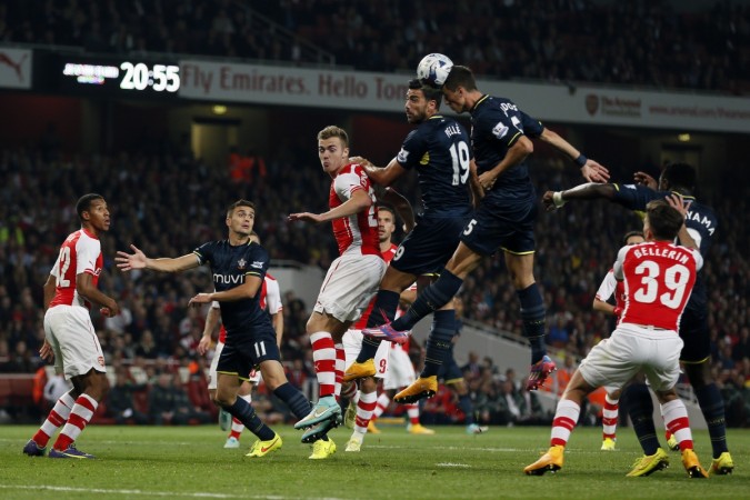 Southampton's Florin Gardos (3rd R) heads the ball during their English League Cup soccer match against Arsenal at the Emirates stadium in London. Arsenal vs Southampton