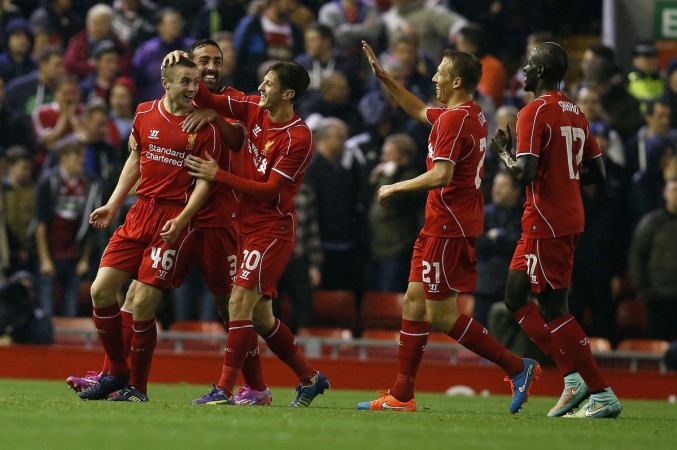 Liverpools Jordan Rossiter (L) celebrates after scoring the opening goal during their League Cup soccer match against Middlesbrough at Anfield in Liverpool. Liverpool