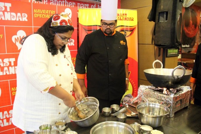 Mast Kalandar Head Chef Samta Gupta demonstrates one of her traditional dishes. mast kalandar