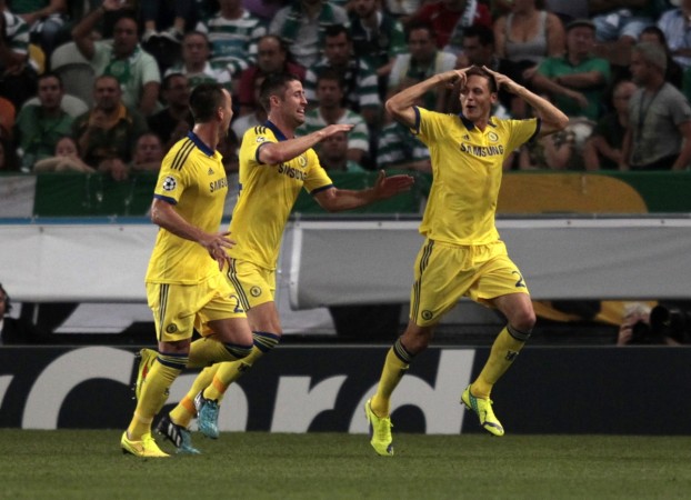 Chelsea's Nemanja Matic (R) celebrates with team mates after scoring a goal against Sporting Lisbon during their Champions League Group G soccer match at the Estadio Jose Alvade in Lisbon. Chelsea