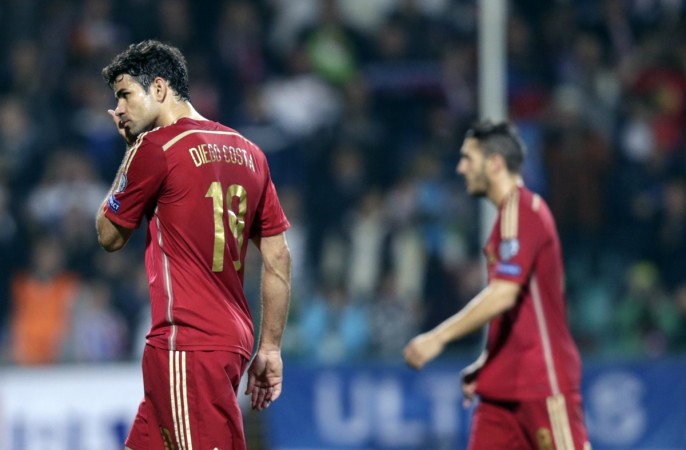 Diego Costa of Spain (L) leaves the pitch following his side's 1-2 defeat to Slovakia at the MSK stadium in Zilina Spain
