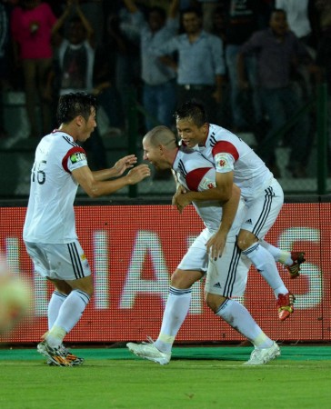 NorthEast United players celebrate the winner scored by Koke in their Indian Super League game against the Kerala Blasters NorthEast United FC Koke