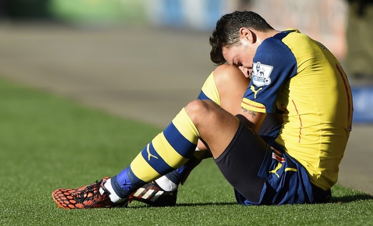 Ozil is facing 12 weeks on the sidelines following a knee ligament injury Mesut Ozil
