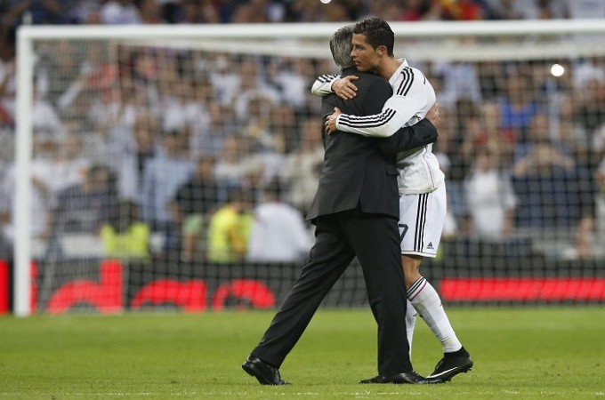 Real Madrid manager Carlo Ancelotti and Cristiano Ronaldo embrace each other after their victory over Barcelona in the El Clasico Carlo Ancelotti Cristiano Ronaldo Real Madrid