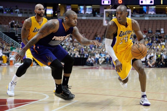 Kobe Bryant will hope to lead the Los Angeles Lakers back into the playoffs Carlos Boozer Kobe Bryant Los Angeles Lakers PJ Tucker Phoenix Suns
