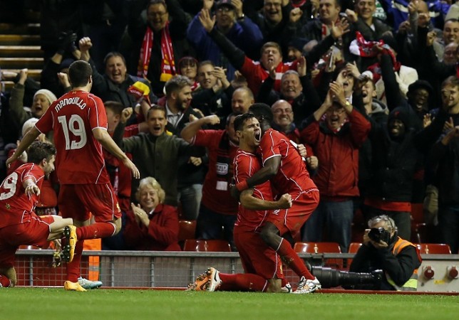 Liverpool defender Dejan Lovren celebrates with his teammates after scoring against Swansea City in their Capital One Cup fourth round tie Dejan Lovren Liverpool