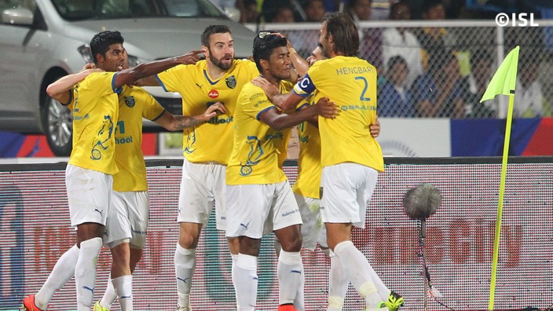 Kerala Blasters' Chinadorai Sabeeth gets congratulated by his teammates following his equaliser against FC Pune City Kerala Blasters