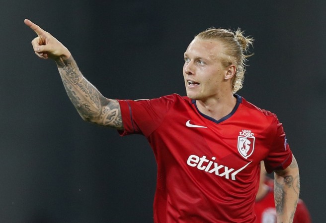 Kjaer could favour a move to Liverpool as his family supports the Merseyside club Simon Kjaer