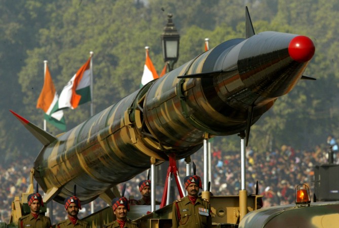 India test-fires its nuclear-capable Agni-II strategic ballistic missile from a military base in Odisha. Agni