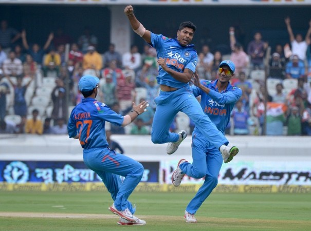 India fast bowler Umesh Yadav celebrates a Sri Lanka wicket with teammates Akshar Patel (R) and Ajinkya Rahane (L) Umesh Yadav India Ajinkya Rahane Akshar Patel