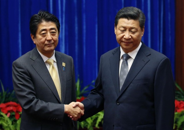 China's Xi and Japan's Abe 'Reconciliation Meet' Photo lands them on Top List of 'Awkward Handshakes' China's Xi and Japan's Abe 'Reconcilation Meet' Photo lands them on Top List of 'Awkward Handshakes'