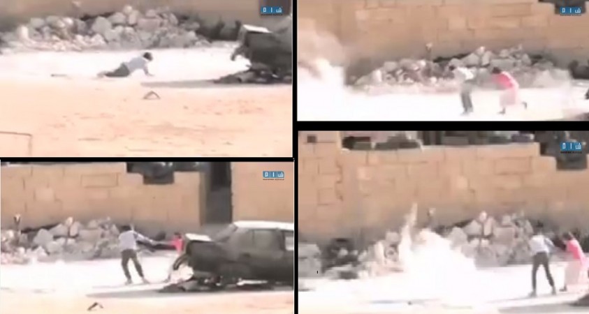 Dramatic video footage out of Syria show young boy braving fire to save his sister.