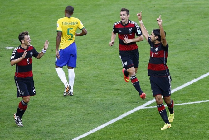 Sami Khedira (R) is concerned about the quality of the English Premier League after seeing Mesut Ozil struggle at Arsenal Mesut Ozil Miroslav Klose Sami Khedira Germany Brazil